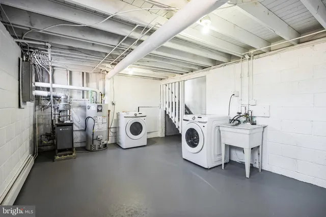 a utility room with dryer and washer