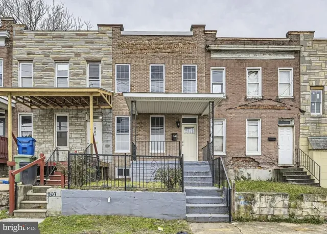 front view of a house with a street