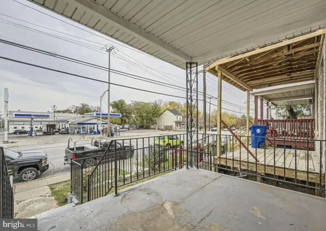 a view of a balcony with city view