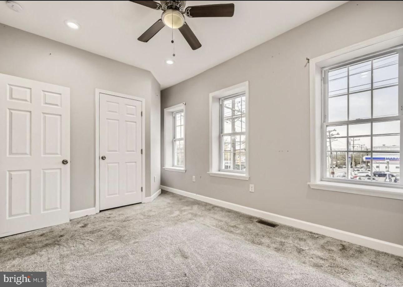 905 East Patapsco Avenue Baltimore, MD 21225 - Photo 10 of 25 a view of an empty room with a window