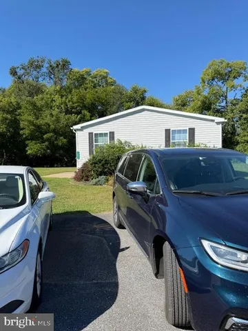 a view of a yard with furniture