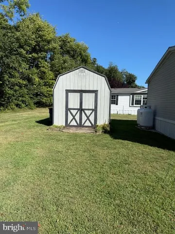 a view of a back yard of the house