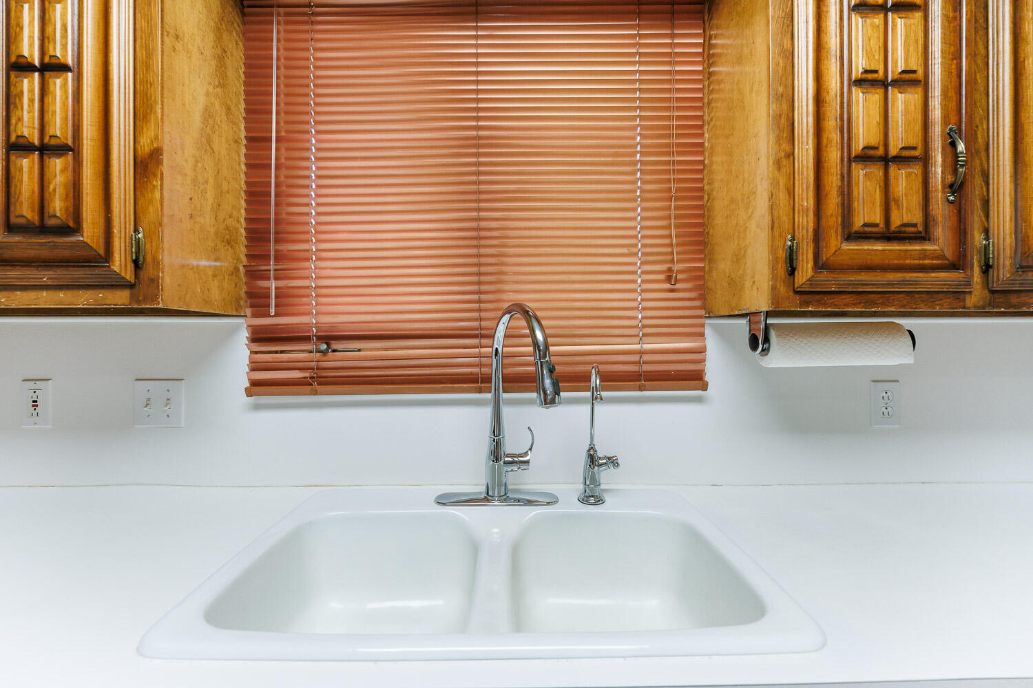 5717 72nd Street Lubbock, TX 79424 - Photo 15 of 54 a bathroom with a sink and a window