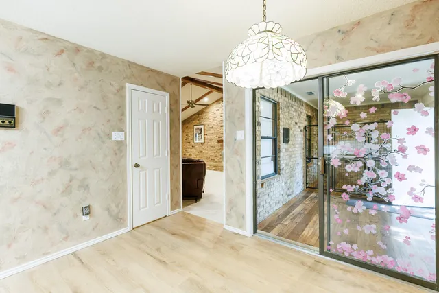 a view of an empty room and window