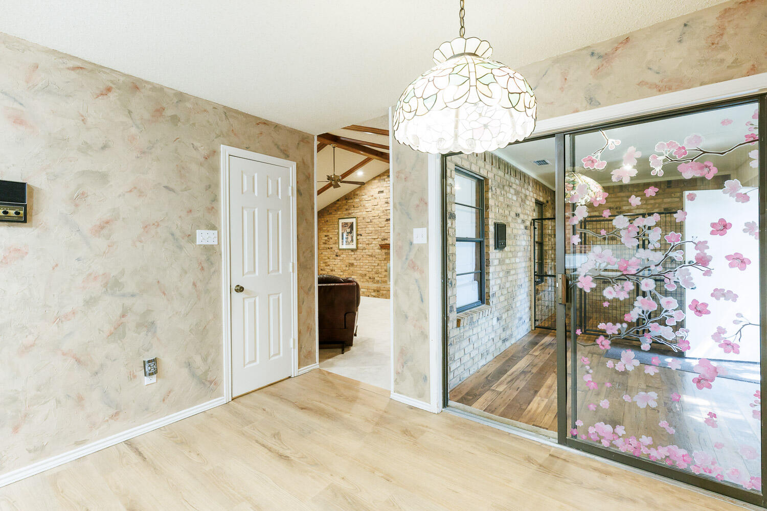 5717 72nd Street Lubbock, TX 79424 - Photo 20 of 54 a bathroom with a glass shower door and a glass door