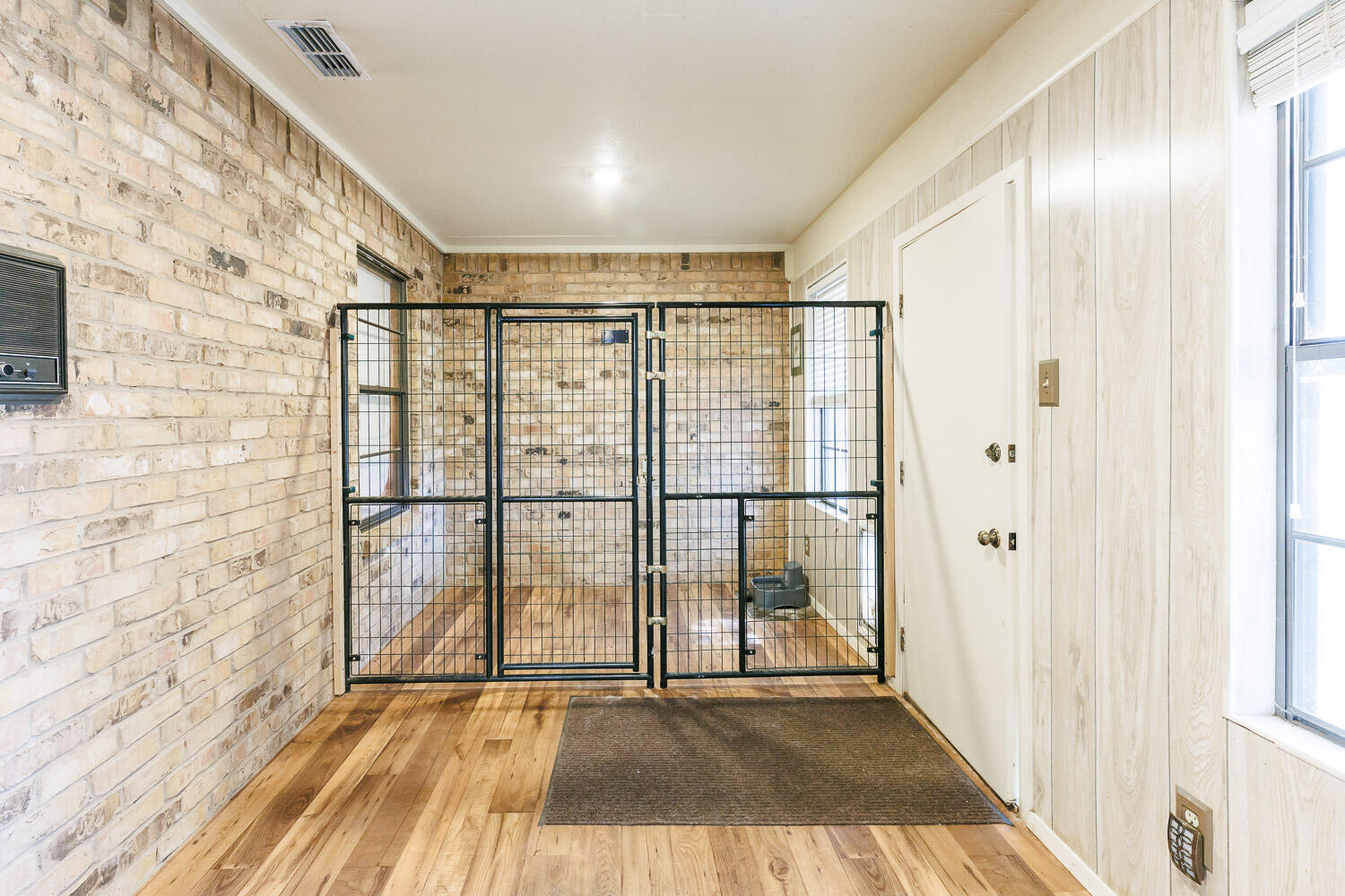 5717 72nd Street Lubbock, TX 79424 - Photo 22 of 54 a view of an empty room with glass door