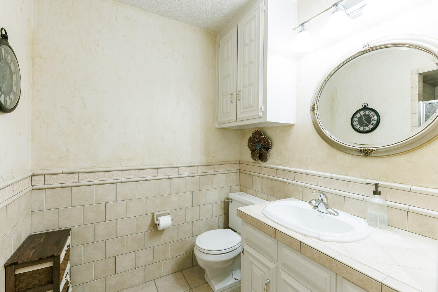 5717 72nd Street Lubbock, TX 79424 - Photo 34 of 54 a bathroom with a toilet and a sink