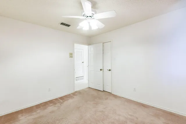 a bathroom with a sink vanity and a mirror