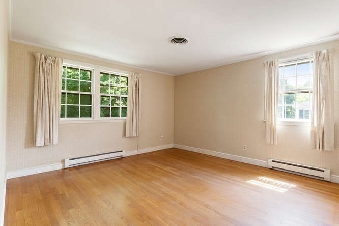 19 Saddle Club Road Lexington, MA 02420 - Photo 20 of 29 an empty room with windows