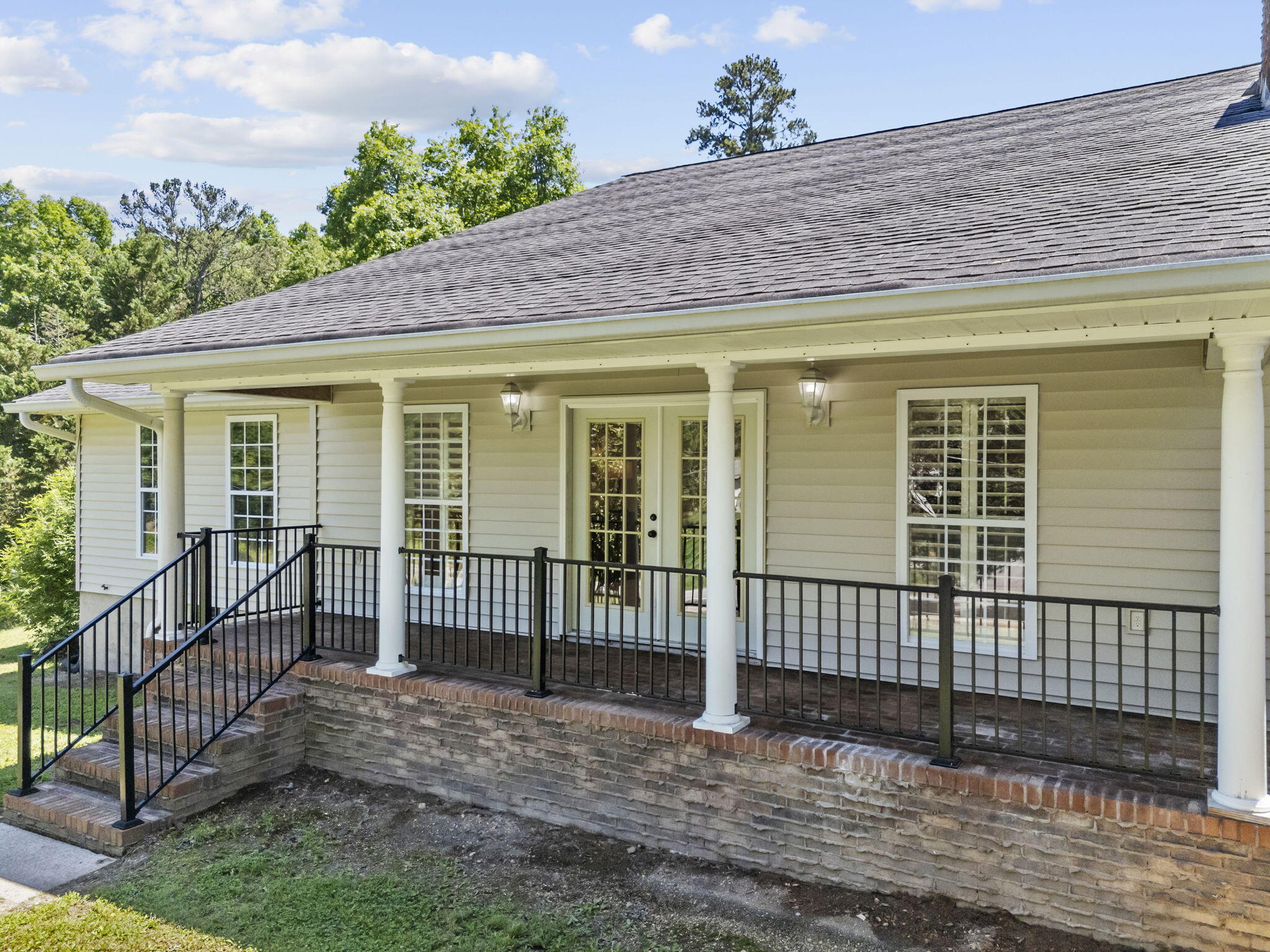 8802 Pine Ridge Road Ooltewah, TN 37363 - Photo 33 of 94 Covered porch from den