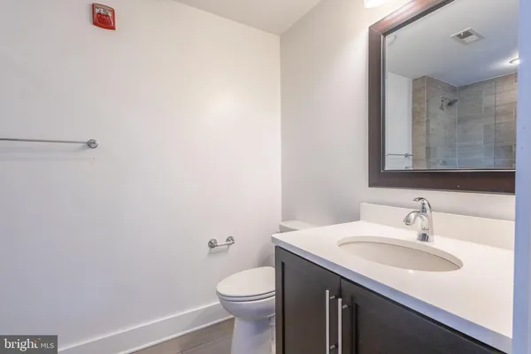 a bathroom with a sink and a toilet
