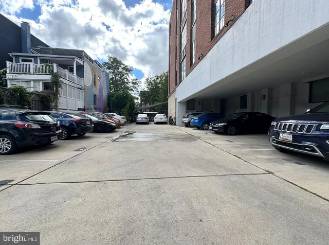 a car parked in front of a building