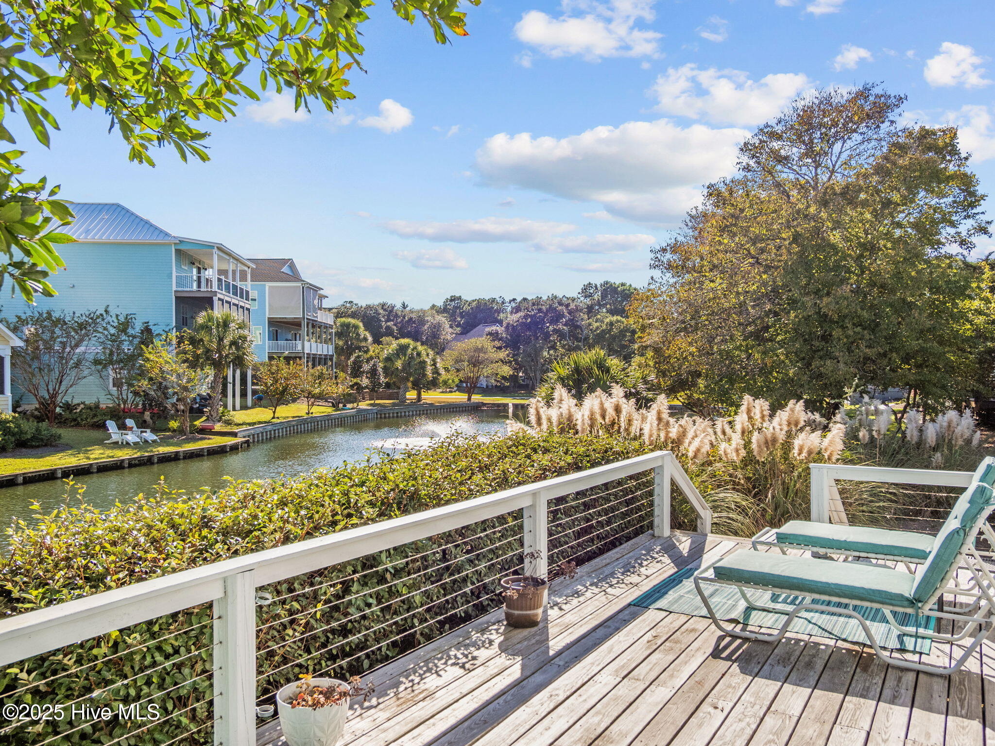 213 Sandfiddler East Emerald Isle, NC 28594 - Photo 2 of 44 back deck overlooking pond