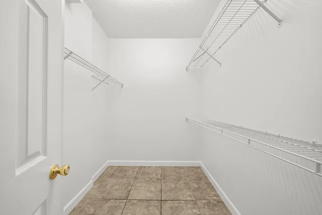 a view of small space with racks on the wall