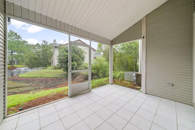 a view of a patio with a backyard