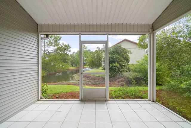 a view of a room with a large window