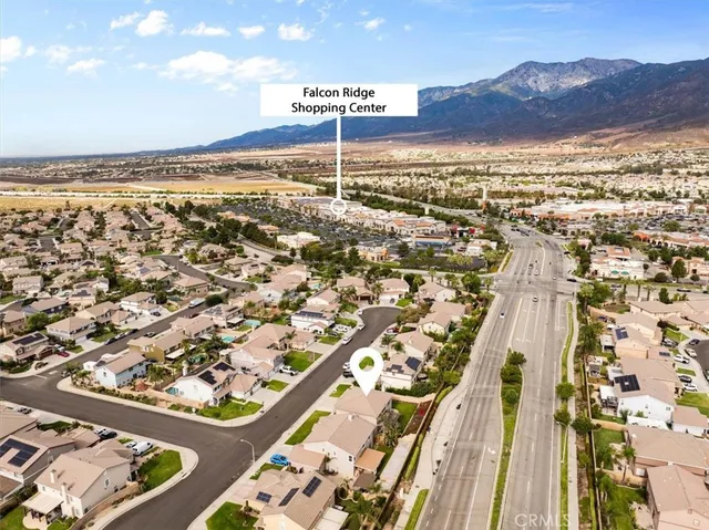 an aerial view of residential building and ocean view