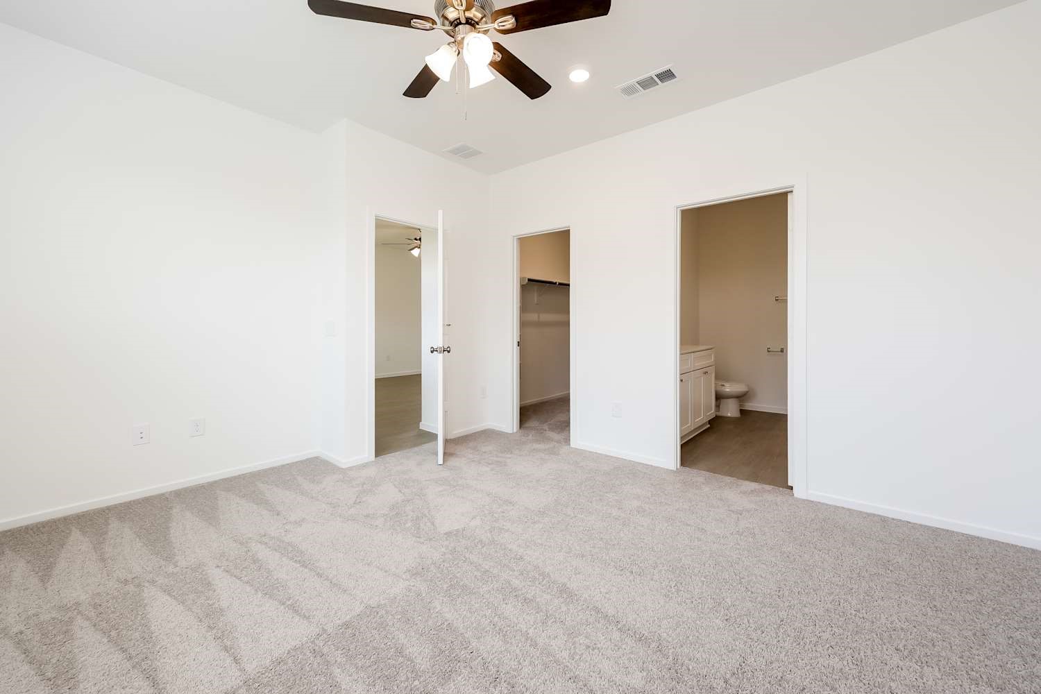 15243 Canyon Rapids Road Conroe, TX 77302 - Photo 11 of 15 a view of a room with a ceiling fan