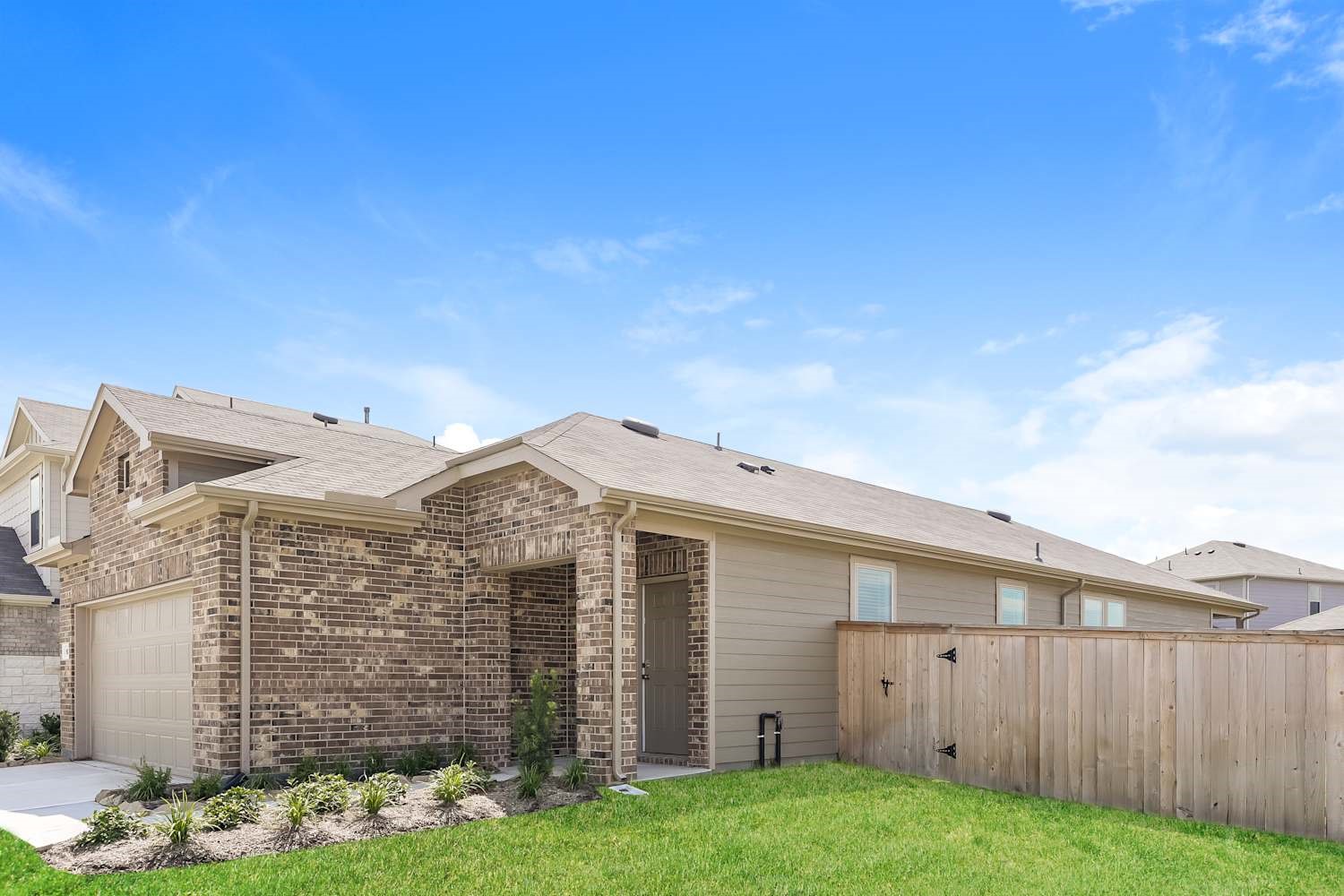 15243 Canyon Rapids Road Conroe, TX 77302 - Photo 3 of 15 front view of a house with a yard