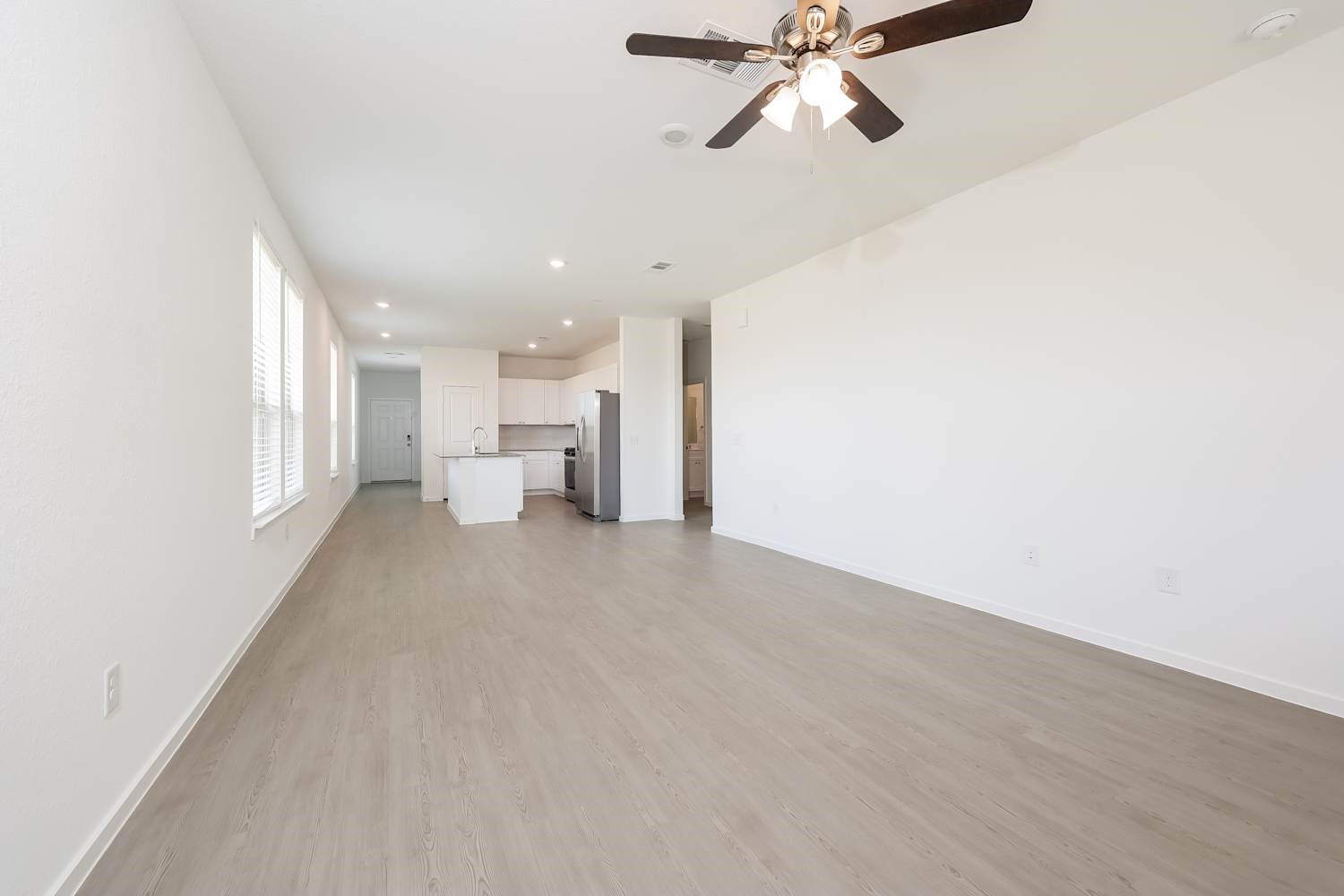 15243 Canyon Rapids Road Conroe, TX 77302 - Photo 5 of 15 a view of a hallway with a window