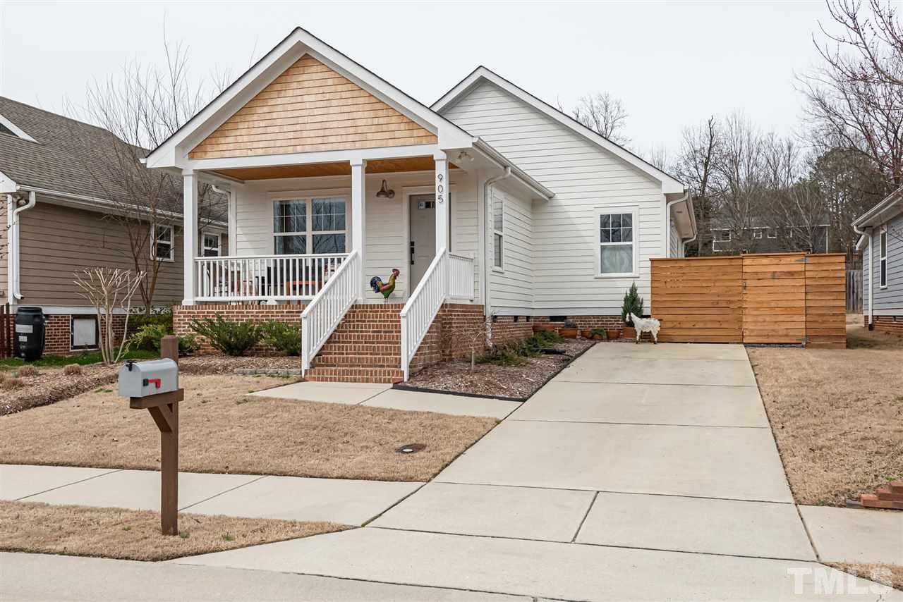 905 Dorothy Sanders Way Raleigh, NC 27601 - Photo 3 of 28 a front view of a house with garage
