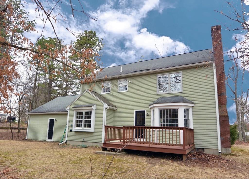4 Bear Path Clinton, MA 01510 - Photo 23 of 23 a front view of a house with garden