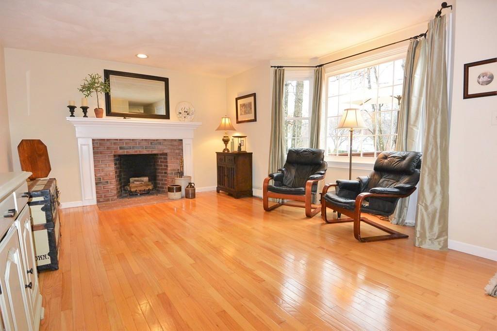 4 Bear Path Clinton, MA 01510 - Photo 8 of 23 a living room with furniture and a fireplace