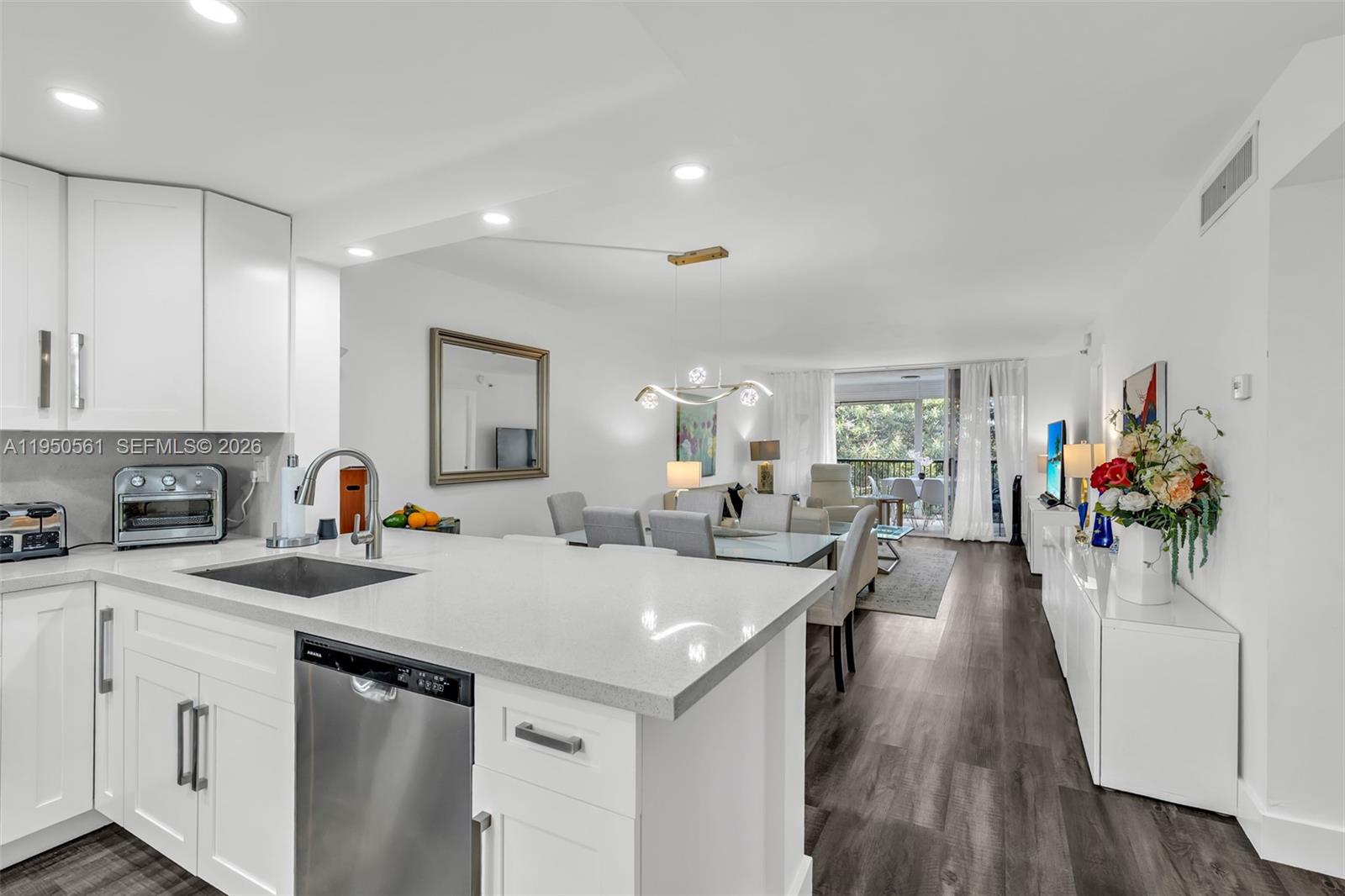 3910 Inverrary Boulevard, Unit 503B Lauderhill, FL 33319 - Photo 1 of 37 a view of a living room and dining room