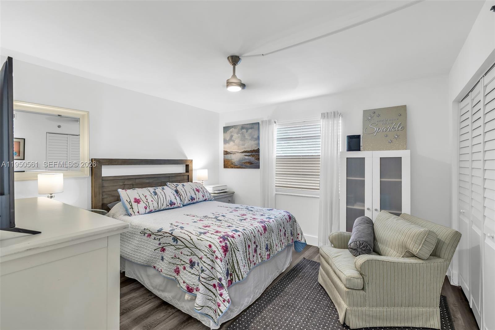 3910 Inverrary Boulevard, Unit 503B Lauderhill, FL 33319 - Photo 16 of 37 a bedroom with a bed and a couch