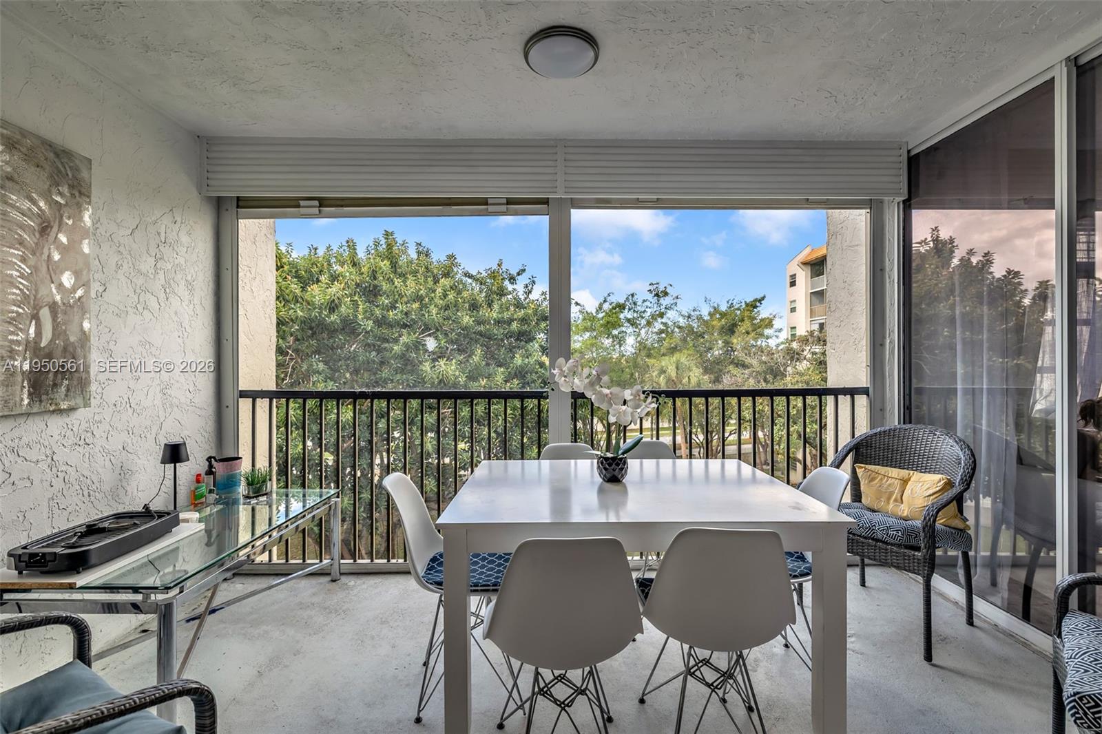 3910 Inverrary Boulevard, Unit 503B Lauderhill, FL 33319 - Photo 23 of 37 a view of a city from a dining room with furniture window and outside view