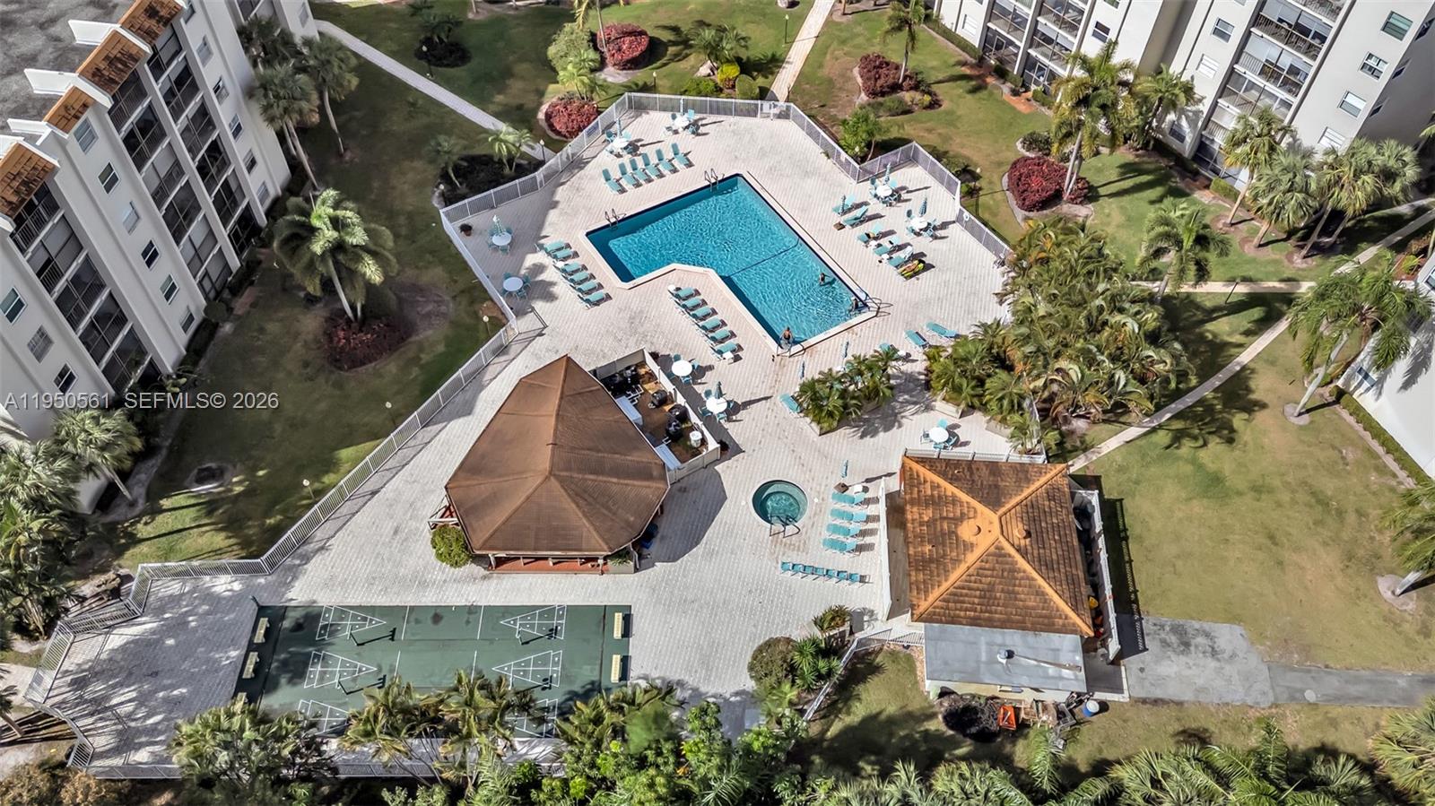 3910 Inverrary Boulevard, Unit 503B Lauderhill, FL 33319 - Photo 28 of 37 an aerial view of a house with a yard and a large tree