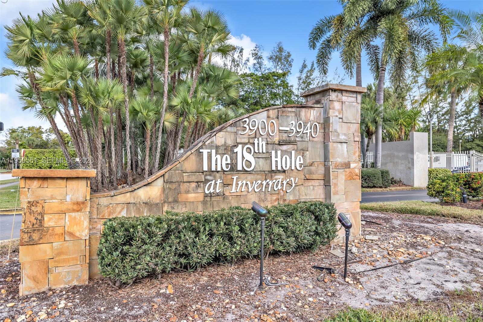 3910 Inverrary Boulevard, Unit 503B Lauderhill, FL 33319 - Photo 36 of 37 a sign on the side of a road