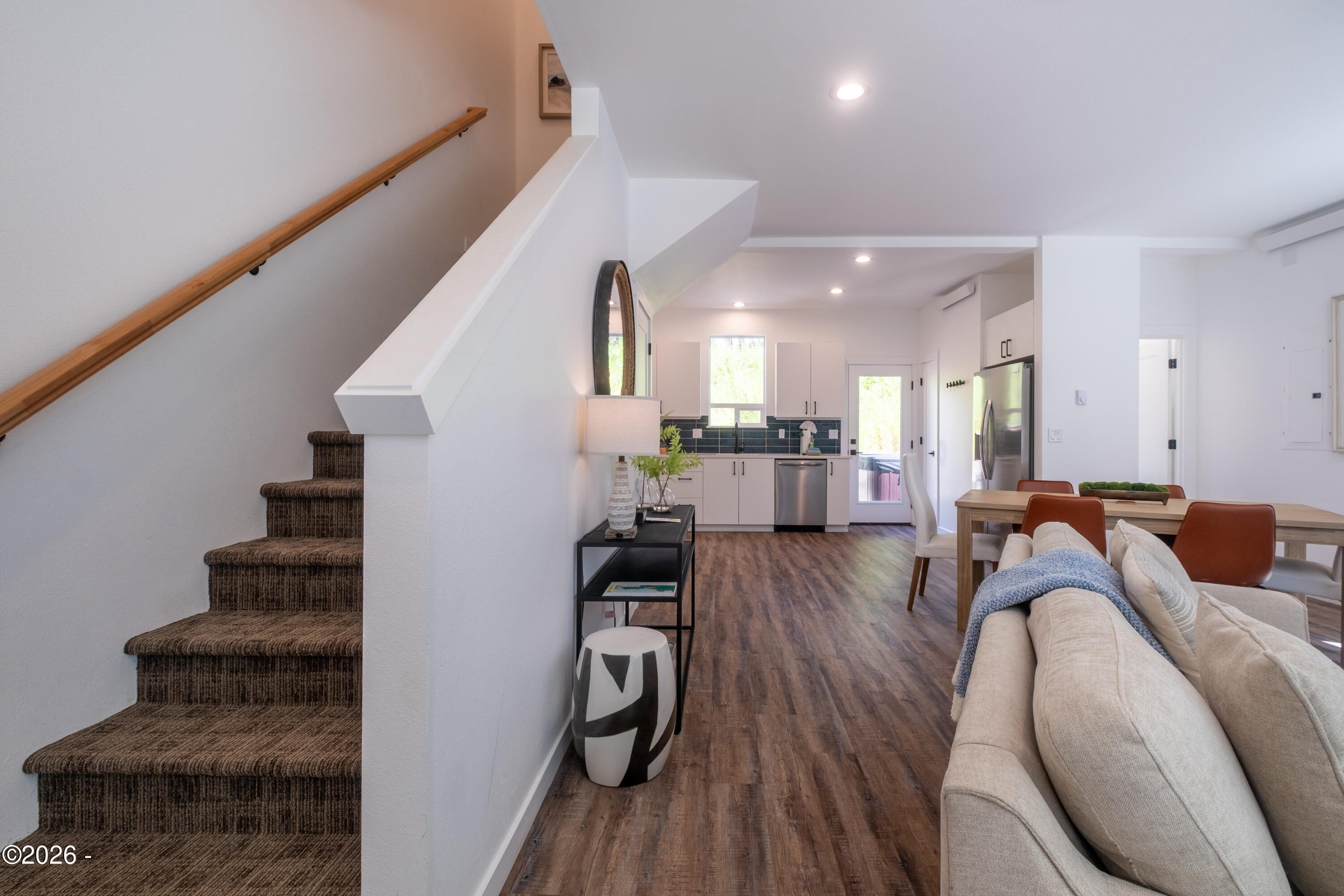 500 Southeast Shell Avenue Depoe Bay, OR 97341 - Photo 15 of 33 You're greeted with LVP flooring through-out the main floor, high ceilings, modern decor, and an open concept with plenty of natural light.