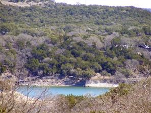 17300 West Reed Park Road Jonestown, TX 78645 - Photo 1 of 1 a view of a lake with mountain