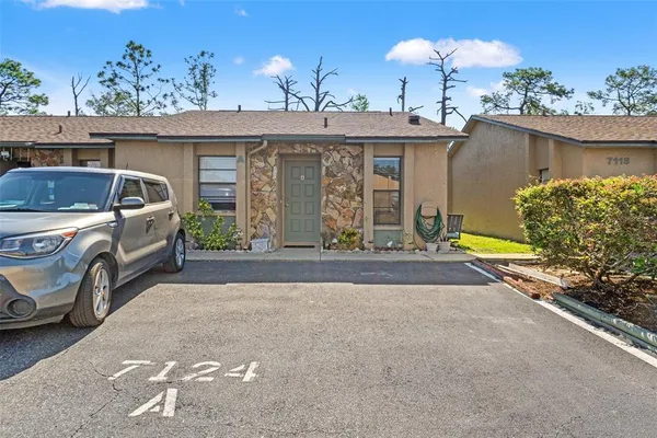 a view of a house with tub and chairs