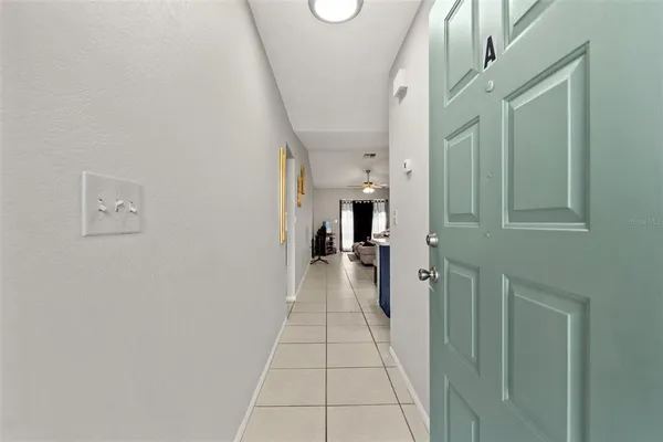 a view of a hallway with a furniture