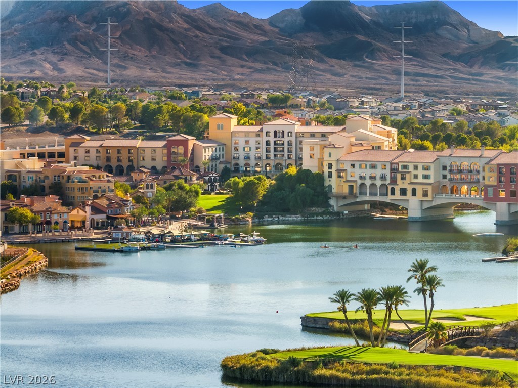 45 Garibaldi Way Henderson, NV 89011 - Photo 60 of 74 A picturesque waterfront community awaits, offering scenic views and a tranquil environment.