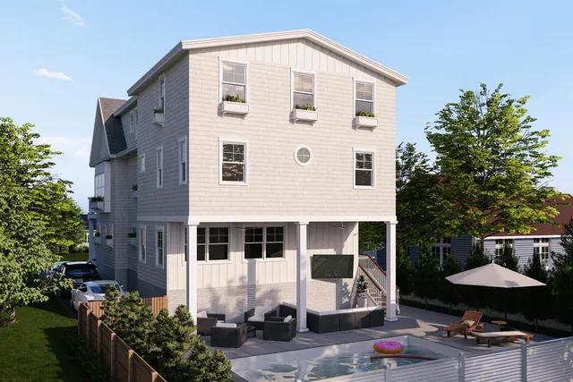 a front view of a house with patio