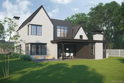 a view of a house with backyard and porch