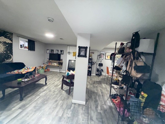 3406 West 74th Street Chicago, IL 60629 - Photo 26 of 47 a living room with furniture and a wooden floor