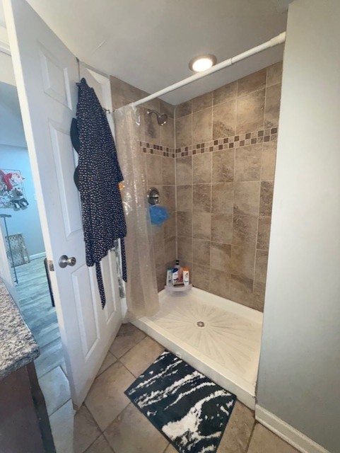 3406 West 74th Street Chicago, IL 60629 - Photo 32 of 47 a bathroom with a bathtub and shower