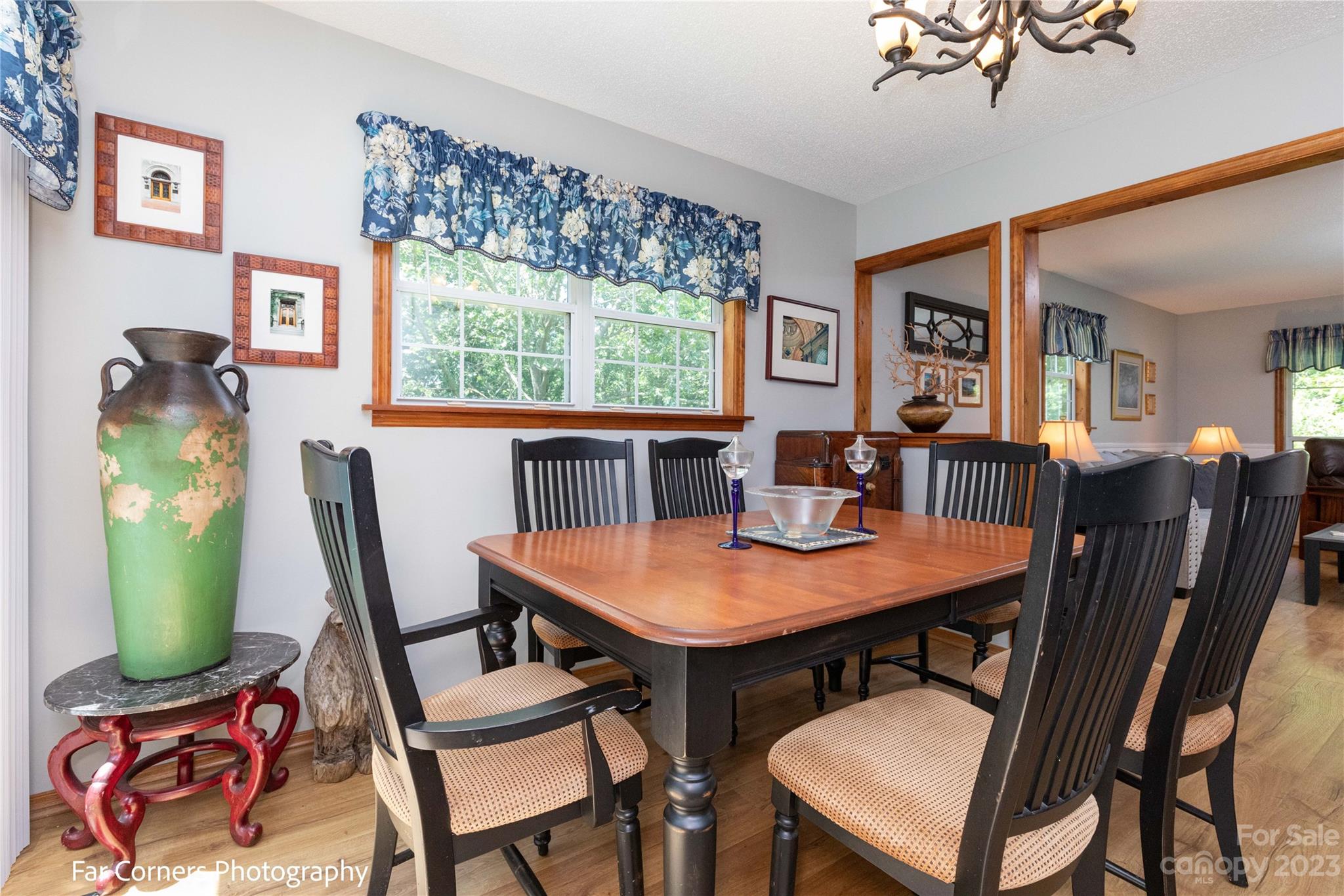 1454 Sorrells Cove Road Clyde, NC 28721 - Photo 15 of 26 a view of a dining room with furniture and a window