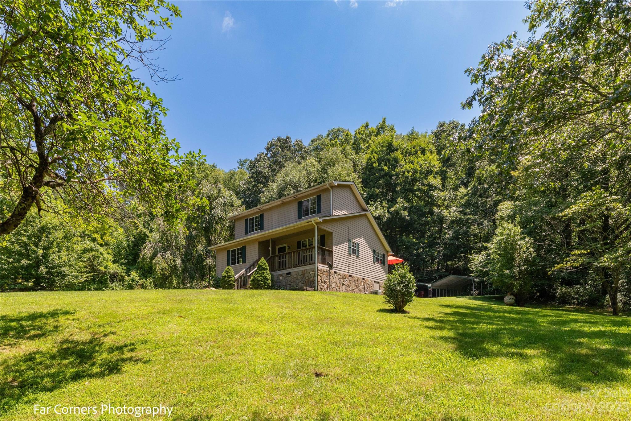 1454 Sorrells Cove Road Clyde, NC 28721 - Photo 2 of 26 a front view of house with yard