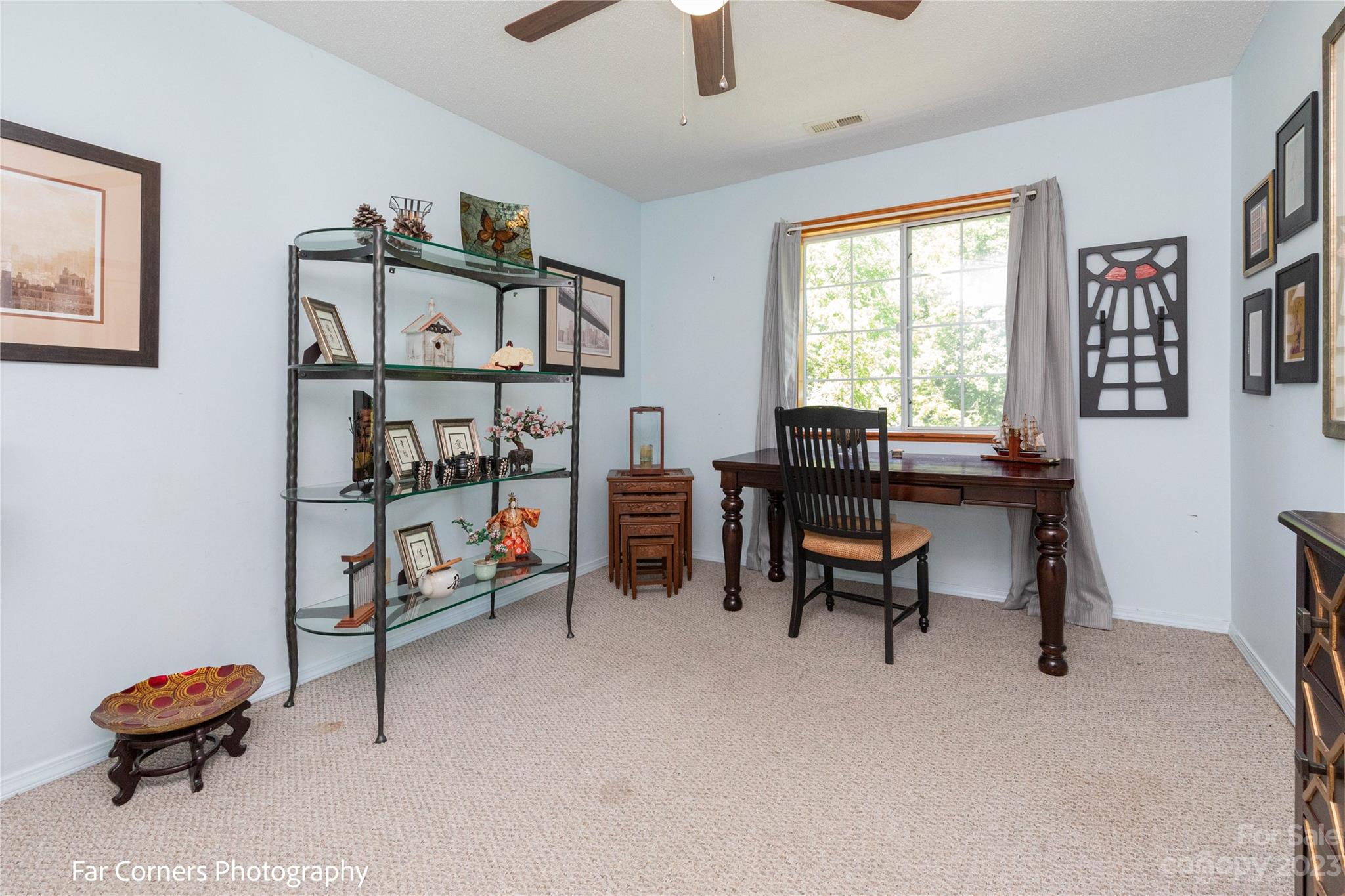 1454 Sorrells Cove Road Clyde, NC 28721 - Photo 24 of 26 a living room with lots of furniture and a window