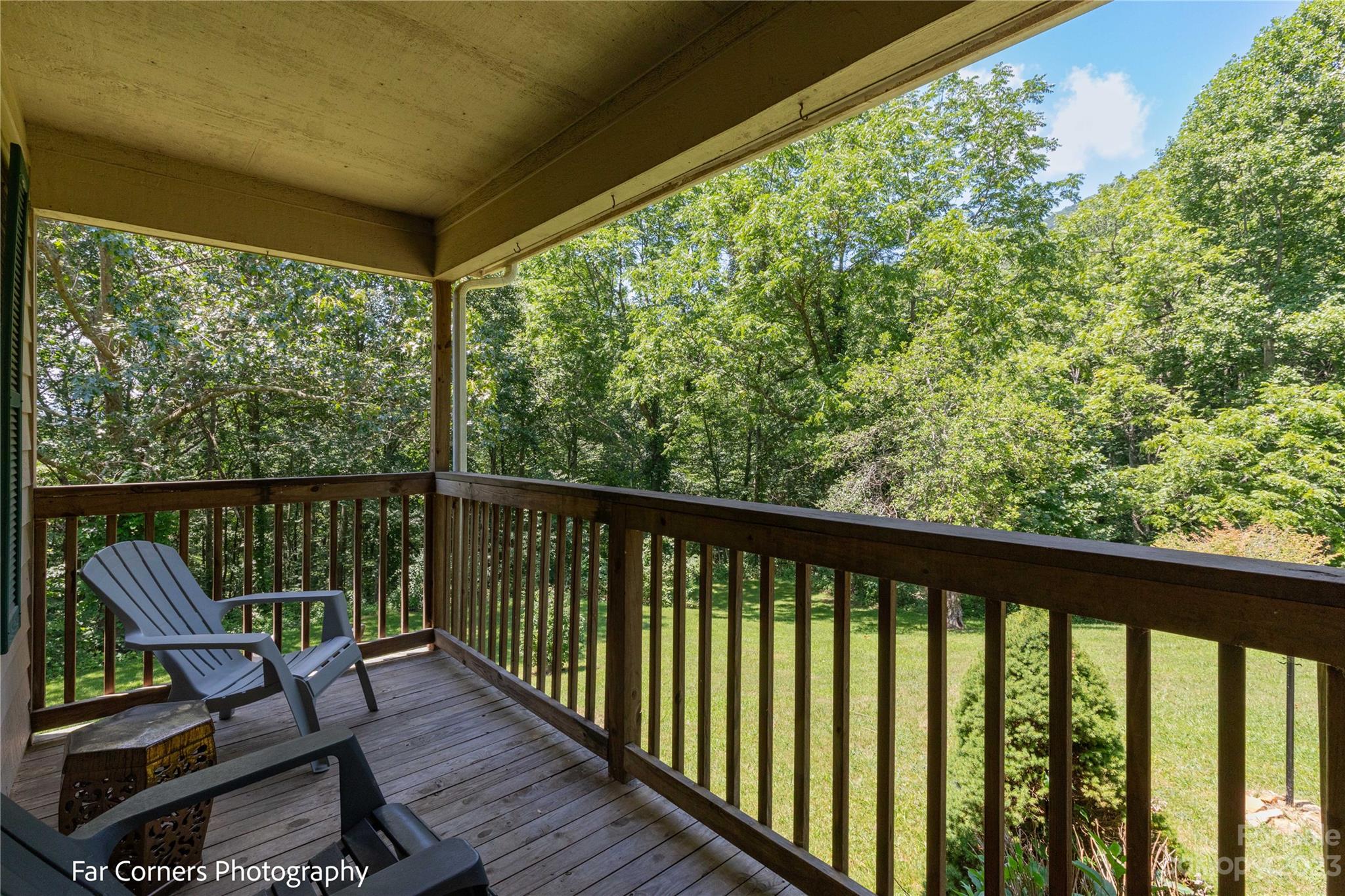 1454 Sorrells Cove Road Clyde, NC 28721 - Photo 6 of 26 a view of a two chair in the balcony