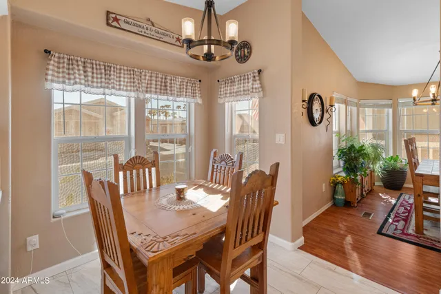 a view of a dining room with furniture