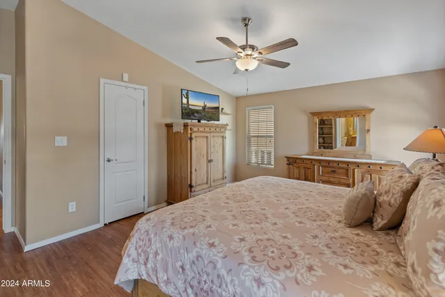 a bathroom with a sink vanity and a mirror