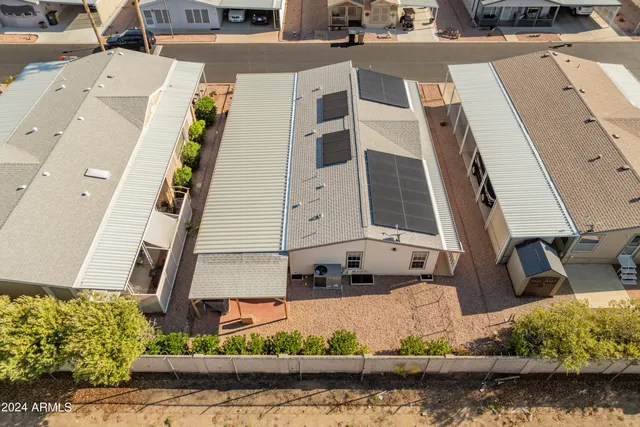 a bedroom with a bed and a view of en suite bathroom