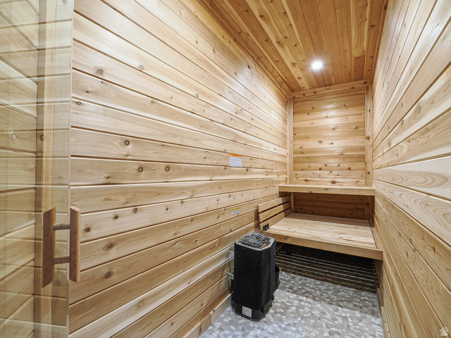 3167 South Mapleton Ests Drive Mapleton, UT 84664 - Photo 25 of 30 Built-in sauna with light wood paneling, integrated wood benches, and a visible heating unit