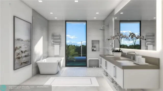 a spacious bathroom with a tub sink and mirror
